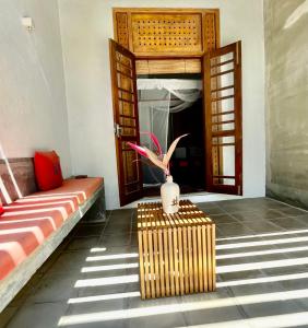 Postel nebo postele na pokoji v ubytování Isana Beach House