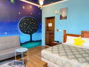 Letto o letti in una camera di Big Fish Homestay