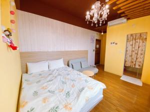 Letto o letti in una camera di Big Fish Homestay