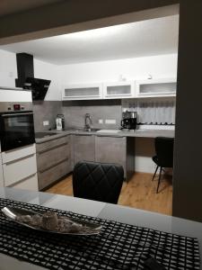 Kuchyň nebo kuchyňský kout v ubytování Haus mit Garten Familie Pabst