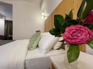 Postel nebo postele na pokoji v ubytování Hotel Pegasus Crown