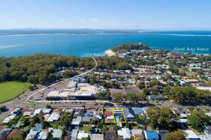 an aerial view of a town next to the water at Beach & Bay Holiday Rental - Nelson Bay in Nelson Bay