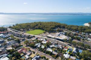 an aerial view of a town next to the water at Beach & Bay Holiday Rental - Nelson Bay in Nelson Bay