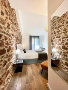 Postel nebo postele na pokoji v ubytování Soléa House Hotel Boutique