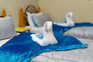 Cama o camas de una habitación en Hôtel Faouzi