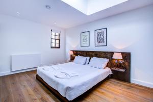 Легло или легла в стая в Beautiful 3-Bedroom House Just Minutes from Queen's Park Tube