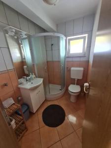 Koupelna v ubytování Apartments Bosnjak