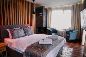 Postel nebo postele na pokoji v ubytování Adess Otel