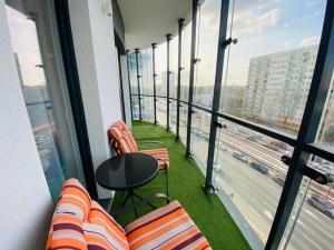 Posedenie v ubytovaní Gustowny apartament na Woli