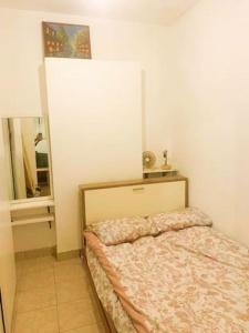 Two rooms apartment with a yard near the beach