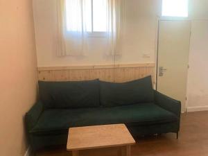 Two rooms apartment with a yard near the beach