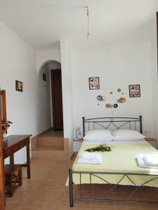 Postel nebo postele na pokoji v ubytování Aggeliki's Apartments