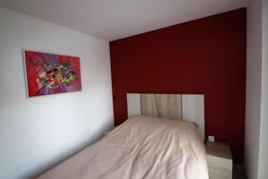 Posteľ alebo postele v izbe v ubytovaní L'Aurore