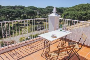 A balcony or terrace at LUXURY STYLE VILLA AURORA Roche