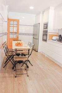 A kitchen or kitchenette at LUXURY STYLE VILLA AURORA Roche