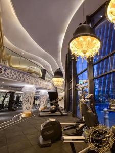 a gym on a cruise ship with chandeliers at ARTE Mont Kiara Relax & Go_Jacuzzi in Kuala Lumpur