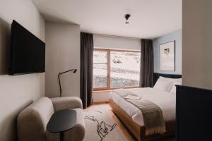 Katil atau katil-katil dalam bilik di The Comodo Bad Gastein, a Member of Design Hotels