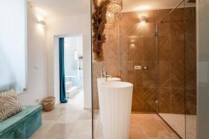 Vonios kambarys apgyvendinimo įstaigoje Apulia Charming Suites - Casa Lonfo Suite Sole