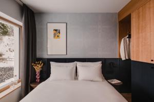 Katil atau katil-katil dalam bilik di The Comodo Bad Gastein, a Member of Design Hotels