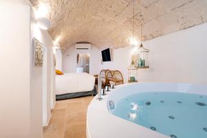 Postel nebo postele na pokoji v ubytování Apulia Charming Suites - Casa Lonfo Suite Sole