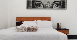 Postel nebo postele na pokoji v ubytování Meet sunset hostel Luangprabang