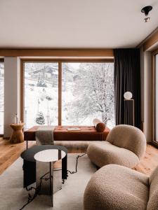 Ruang duduk di The Comodo Bad Gastein, a Member of Design Hotels