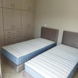 เตียงในห้องที่ Voula home -IOANNINA-NEOKESARIA