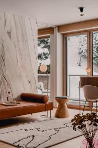 Ruang duduk di The Comodo Bad Gastein, a Member of Design Hotels