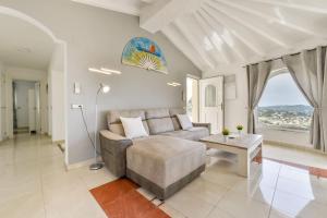 Posteľ alebo postele v izbe v ubytovaní Villas Guzman - Tango