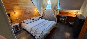 Katil atau katil-katil dalam bilik di Hotel Valérie
