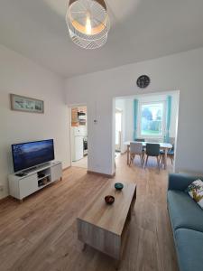 Televízia a/alebo spoločenská miestnosť v ubytovaní La ScarpeHouse - Douai - Wifi