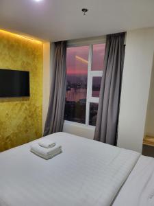Letto o letti in una camera di Sempre Premier Inn - MACTAN AIRPORT HOTEL