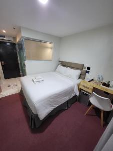 Letto o letti in una camera di Sempre Premier Inn - MACTAN AIRPORT HOTEL