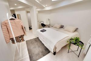 Postel nebo postele na pokoji v ubytování Best location in Tampere! Modern city apartment, 2rooms, kitchen and balcony