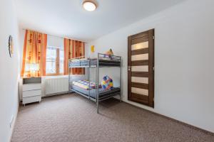 Posteľ alebo postele v izbe v ubytovaní Apartmanovy dům Bublajda