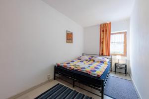 Posteľ alebo postele v izbe v ubytovaní Apartmanovy dům Bublajda