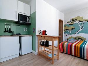 Kuchyňa alebo kuchynka v ubytovaní Studio Calanques près du Vieux Port