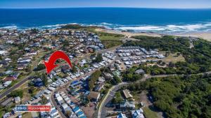 an aerial view of a resort near the ocean at Birubi Beach House in Anna Bay