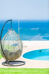 Πισίνα στο ή κοντά στο Kosta Mare Villa, panoramic views, By ThinkVilla