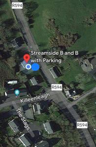 a map of a road with a red dot with parking at Streamside B and B with Parking in Drom dhá Liag