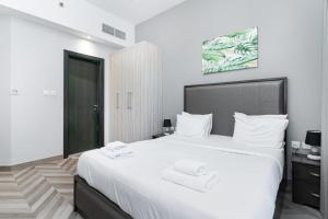 Voodi või voodid majutusasutuse Family-Sized 4BR I Pool, Jacuzzi & Gym toas
