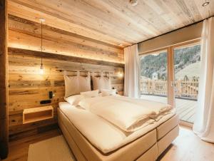Łóżko lub łóżka w pokoju w obiekcie Gletscher-Chalet Stubai