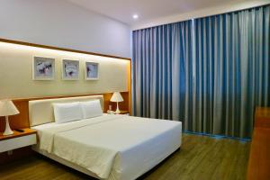 Postel nebo postele na pokoji v ubytování Sammy Hotel