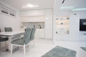 Kuchyň nebo kuchyňský kout v ubytování Apartman Pascal
