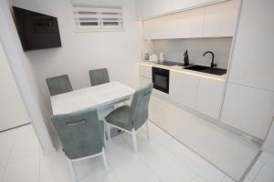 Kuchyň nebo kuchyňský kout v ubytování Apartman Pascal