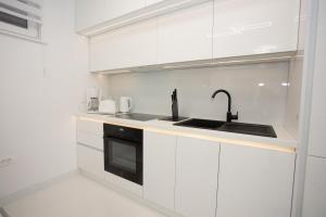 Kuchyň nebo kuchyňský kout v ubytování Apartman Pascal