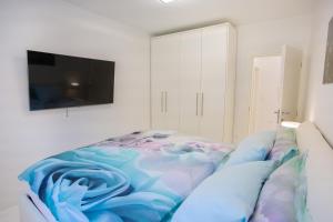 Postel nebo postele na pokoji v ubytování Apartman Pascal
