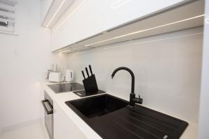 Kuchyň nebo kuchyňský kout v ubytování Apartman Pascal