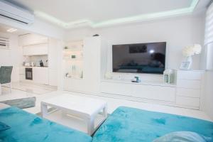 TV a/nebo společenská místnost v ubytování Apartman Pascal