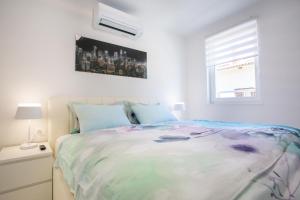 Postel nebo postele na pokoji v ubytování Apartman Pascal